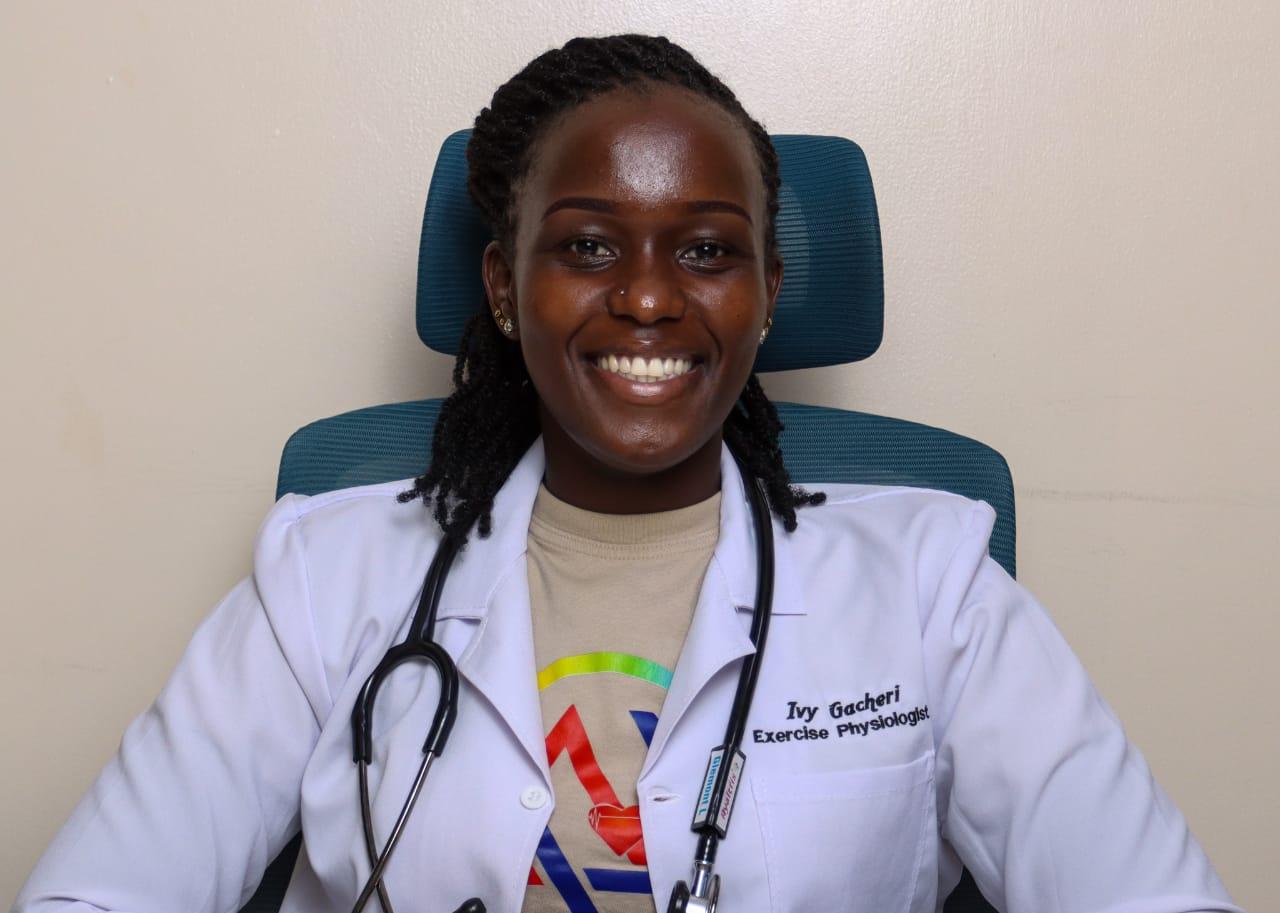 Ivy Gacheri smiling in clinical setting